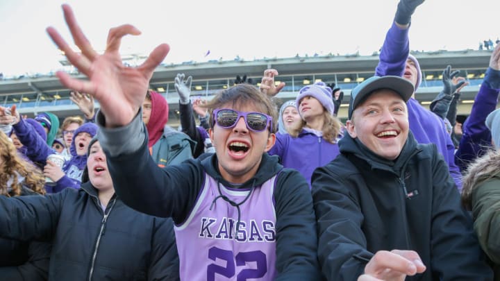 Oct 28, 2023; Manhattan, Kansas, USA; Kansas State Wildcats fans celebrate before the start of a game against the Houston Cougars at Bill Snyder Family Football Stadium. Mandatory Credit: Scott Sewell-USA TODAY Sports