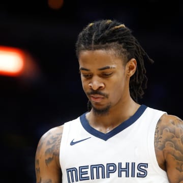 Dec 31, 2023; Memphis, Tennessee, USA; Memphis Grizzlies guard Ja Morant (12) reacts during the second half against the Sacramento Kings at FedExForum. Mandatory Credit: Petre Thomas-USA TODAY Sports