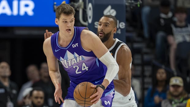 Utah Jazz Center Walker Kessler (24) heads for the basket while the center of Minnesota Timberwolves Rudy Gobert
