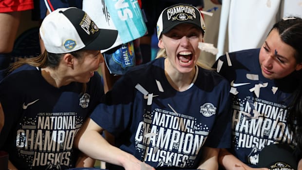 Paige Bueckers celebrates a national title