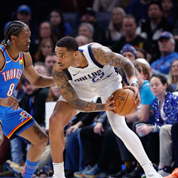 Oklahoma City Thunder forward Jalen Williams defends Dallas Mavericks forward P.J. Washington.