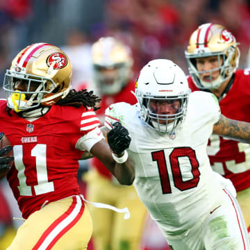 Dec 17, 2023; Glendale, Arizona, USA; San Francisco 49ers wide receiver Brandon Aiyuk (11) runs the ball against San Francisco 49ers wide receiver Ronnie Bell (10) during the second half at State Farm Stadium. Mandatory Credit: Mark J. Rebilas-USA TODAY Sports