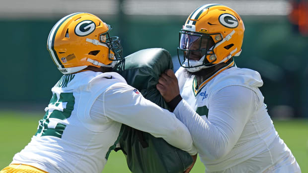 Green Bay Packers offensive tackle Rasheed Walker (right) is shown with rookie Jacob Monk (62) during OTAs.