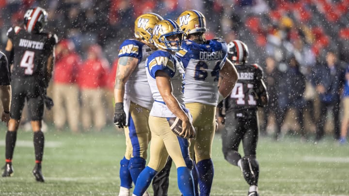 Jun 13, 2024; Ottawa, Ontario, CAN; Winnipeg Blue Bombers quarterback Zach Collards (8) looks on after a failed drive at the end of the second half against the Ottawa REDBLACKS at TD Place. Mandatory Credit: Marc DesRosiers-USA TODAY Sports