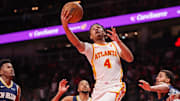 Dec 2, 2024; Atlanta, Georgia, USA; Atlanta Hawks guard Kobe Bufkin (4) shoots against the New Orleans Pelicans in the second quarter at State Farm Arena. Mandatory Credit: Brett Davis-Imagn Images
