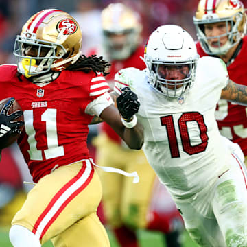 Dec 17, 2023; Glendale, Arizona, USA; San Francisco 49ers wide receiver Brandon Aiyuk (11) runs the ball against San Francisco 49ers wide receiver Ronnie Bell (10) during the second half at State Farm Stadium. Mandatory Credit: Mark J. Rebilas-USA TODAY Sports