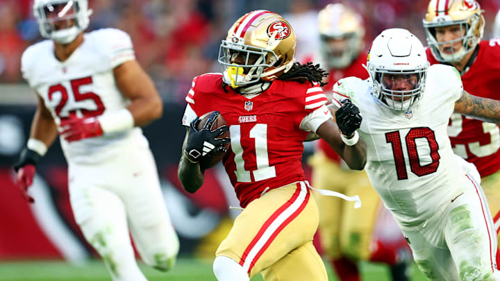 Dec 17, 2023; Glendale, Arizona, USA; San Francisco 49ers wide receiver Brandon Aiyuk (11) runs the ball against San Francisco 49ers wide receiver Ronnie Bell (10) during the second half at State Farm Stadium. Mandatory Credit: Mark J. Rebilas-USA TODAY Sports