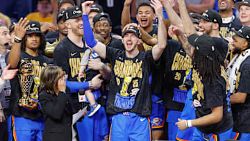 Jun 22, 2025; Oklahoma City, Oklahoma, USA; Oklahoma City Thunder guard Alex Caruso (9) during the NBA Championship trophy presentation after game seven of the 2025 NBA Finals against the Indiana Pacers at Paycom Center. Mandatory Credit: Alonzo Adams-Imagn Images