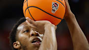 Dec 6, 2025; Raleigh, North Carolina, USA; NC State Wolfpack guard Quadir Copeland (11) shoots a free throw during the first half of the game against UNC Asheville Bulldogs at Lenovo Center. Mandatory Credit: Jaylynn Nash-Imagn Images