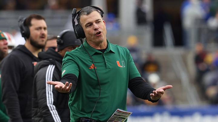Nov 29, 2025; Pittsburgh, Pennsylvania, USA;  Miami Hurricanes head coach Mario Cristobal reacts on the sidelines against the Pittsburgh Panthers during the third quarter at Acrisure Stadium. Mandatory Credit: Charles LeClaire-Imagn Images