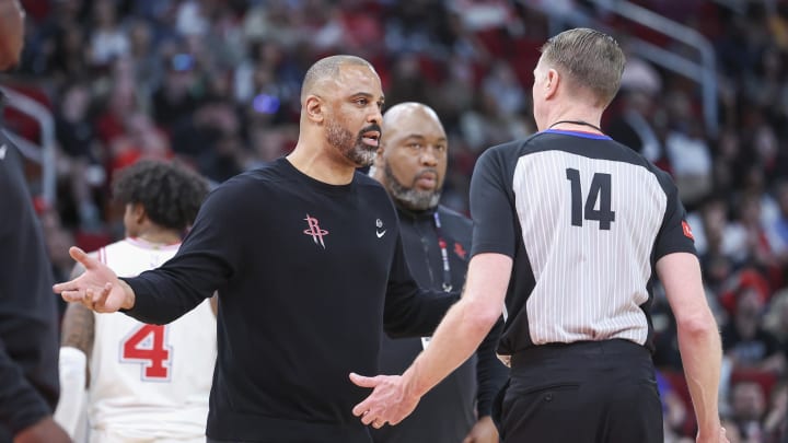 Apr 5, 2024; Houston, Texas, USA; Houston Rockets head coach Ime Udoka talks with an official during the fourth quarter against the Miami Heat at Toyota Center. Mandatory Credit: Troy Taormina-USA TODAY Sports