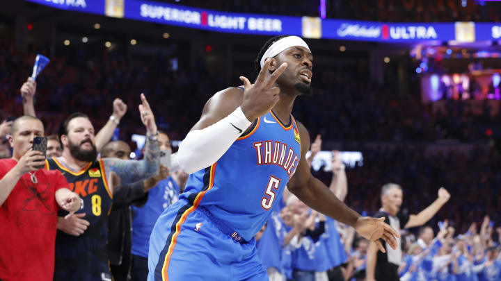 May 9, 2024; Oklahoma City, Oklahoma, USA; Oklahoma City Thunder guard Luguentz Dort (5) gestures after scoring a three-point basket against the Dallas Mavericks during the second quarter of game two of the second round for the 2024 NBA playoffs at Paycom Center. Mandatory Credit: Alonzo Adams-USA TODAY Sports