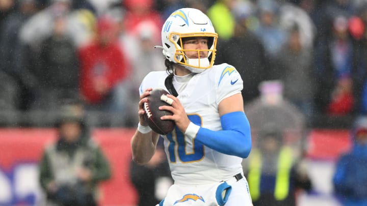 Dec 3, 2023; Foxborough, Massachusetts, USA; Los Angeles Chargers quarterback Justin Herbert (10) looks to throw against the New England Patriots during the first half at Gillette Stadium. Mandatory Credit: Brian Fluharty-USA TODAY Sports