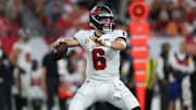 Oct 12, 2025; Tampa, Florida, USA; Tampa Bay Buccaneers quarterback Baker Mayfield (6) throws downfield during the fourth quarter against the San Francisco 49ers at Raymond James Stadium. Mandatory Credit: Nathan Ray Seebeck-Imagn Images