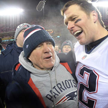 Jan 20, 2019; Kansas City, MO, USA; New England Patriots quarterback Tom Brady (12) celebrates with coach Bill Belichick after the AFC Championship game against the Kansas City Chiefs at Arrowhead Stadium. The Patriots defeated the Chiefs 37-31 in overtime to advance to fifth Super Bowl in eight seasons. Mandatory Credit: Kirby Lee-Imagn Images