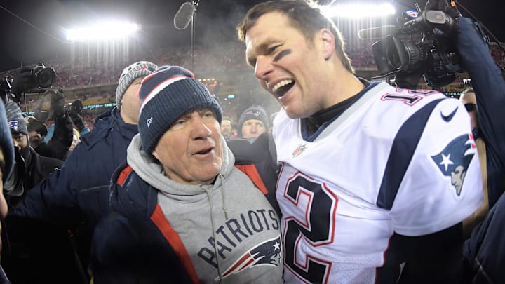 Jan 20, 2019; Kansas City, MO, USA; New England Patriots quarterback Tom Brady (12) celebrates with coach Bill Belichick after the AFC Championship game against the Kansas City Chiefs at Arrowhead Stadium. The Patriots defeated the Chiefs 37-31 in overtime to advance to fifth Super Bowl in eight seasons. Mandatory Credit: Kirby Lee-Imagn Images