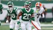 Nov 9, 2025; East Rutherford, New Jersey, USA; New York Jets running back Breece Hall (20) carries the ballduring the first half against the Cleveland Browns at MetLife Stadium. Mandatory Credit: Vincent Carchietta-Imagn Images