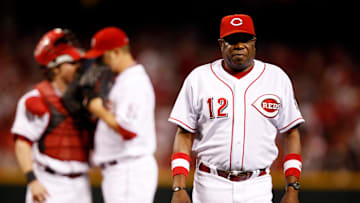 2010.10.10 REDS SPORTS : The Cincinnati Reds the Philadelphia Phillies in the third game of their NLDS playoff game at Great American Ball Park in Cincinnati Sunday October 10, 2010. 
Reds Manager Dusty Baker walks back to the dugout after handing the ball to relief pitcher Nick Masset who took over from Bill Bray. The Enquirer/Jeff Swinger

Redsjs4728