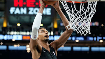 Oct 6, 2025; San Antonio, TX, USA; San Antonio Spurs forward-center Victor Wembanyama (1) warms up before a game against the Guangzhou Loong Lions at Frost Bank Center.