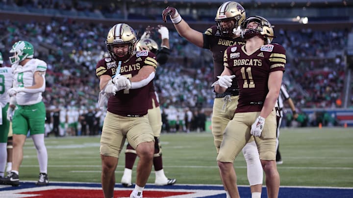 Jan 3, 2025; Dallas, TX, USA; Texas State Bobcats running back Lincoln Pare (7) celebrates after scoring a touchdown against the North Texas Mean Green during the third quarter at Gerald J. Ford Stadium. Mandatory Credit: Tim Heitman-Imagn Images Jan 3, 2025; Dallas, TX, USA; Texas State Bobcats running back Lincoln Pare (7) celebrates after scoring a touchdown against the North Texas Mean Green during the third quarter at Gerald J. Ford Stadium. Mandatory Credit: Tim Heitman-Imagn Images