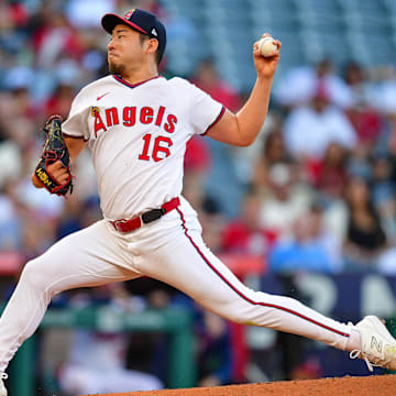 Jul 7, 2025; Anaheim, California, USA; Los Angeles Angels pitcher Yusei Kikuchi (16) throws against the Texas Rangers during the first inning at Angel Stadium. Mandatory Credit: Gary A. Vasquez-Imagn Images