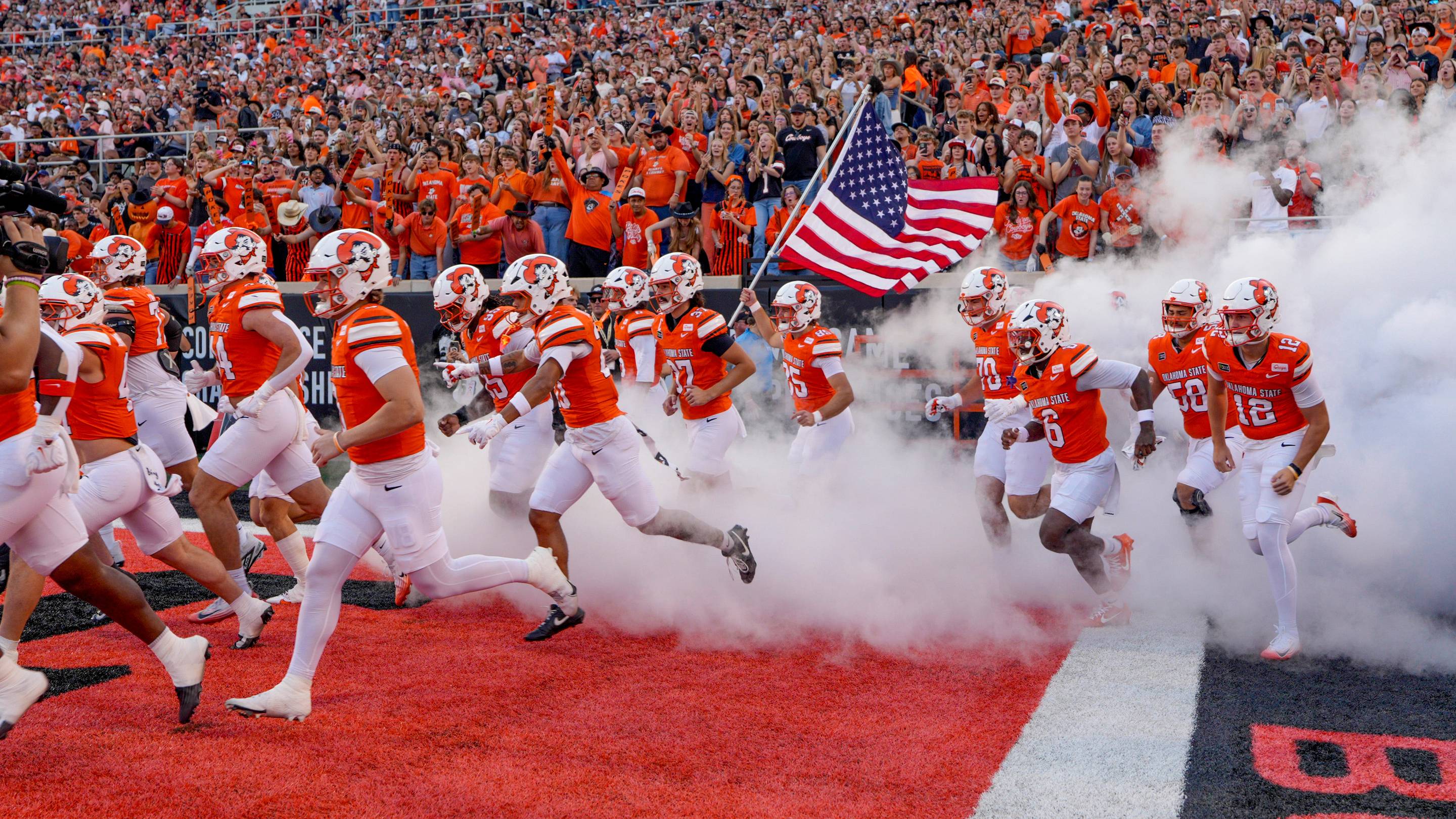 The Oklahoma State Cowboys take the field. | USA TODAY Network via Reuters Connect
