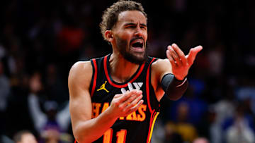 Trae Young #11 of the Atlanta Hawks reacts against the Detroit Pistons.