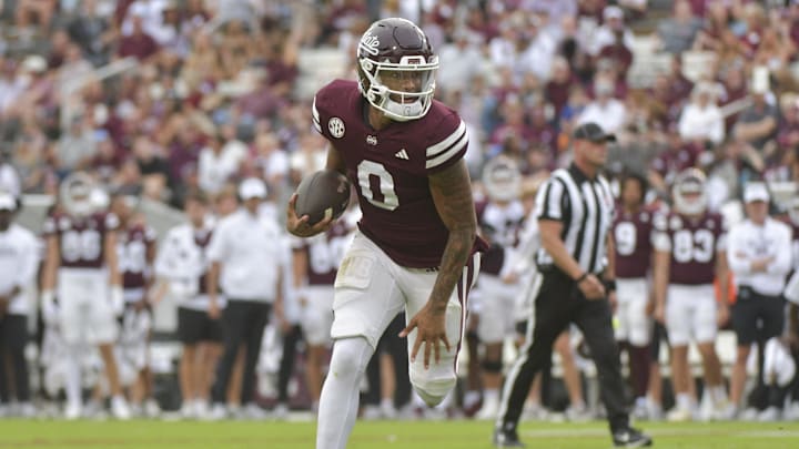 Nov 2, 2024; Starkville, Mississippi, USA;  Mississippi State Bulldogs quarterback Michael Van Buren Jr. (0) runs the ball against the Massachusetts Minutemen during the second quarter at Davis Wade Stadium at Scott Field. Mandatory Credit: Matt Bush-Imagn Images