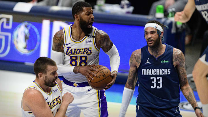 Apr 24, 2021; Dallas, Texas, USA; Los Angeles Lakers forward Markieff Morris (88) grabs a rebound in front of Dallas Mavericks center Willie Cauley-Stein (33) during the second quarter at the American Airlines Center. Mandatory Credit: Jerome Miron-Imagn Images