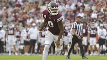 Nov 2, 2024; Starkville, Mississippi, USA;  Mississippi State Bulldogs quarterback Michael Van Buren Jr. (0) runs the ball against the Massachusetts Minutemen during the second quarter at Davis Wade Stadium at Scott Field. Mandatory Credit: Matt Bush-Imagn Images