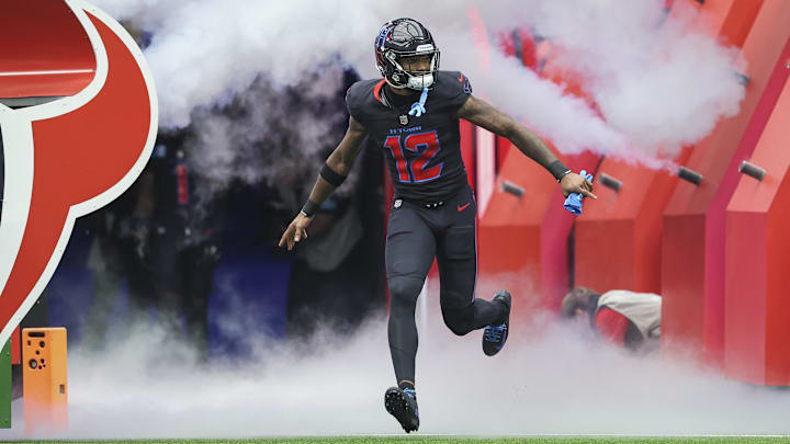Oct 6, 2024; Houston, Texas, USA; Houston Texans wide receiver Nico Collins (12) is introduced before the game against the Buffalo Bills at NRG Stadium. Mandatory Credit: Troy Taormina-Imagn Images