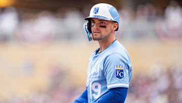 May 24, 2025; Minneapolis, Minnesota, USA; The third base umpire calls Kansas City Royals left fielder Michael Massey (19) out for swinging on a ball pitched by Minnesota Twins starting pitcher Zebby Matthews (52, not shown) in the second inning at Target Field. Mandatory Credit: Matt Blewett-Imagn Images