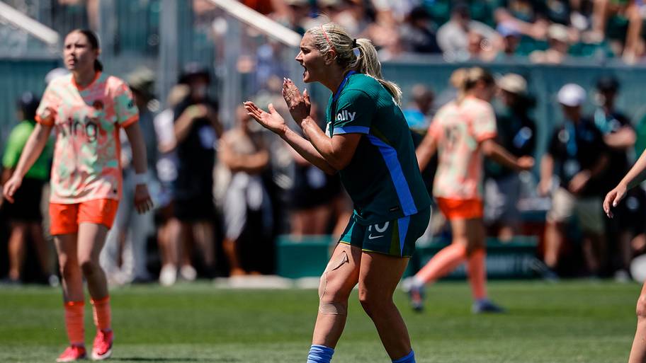 Denver Summit FC midfielder Lindsey Heaps reacts in the second half against the Portland Thorns