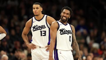 Mar 14, 2025; Phoenix, Arizona, USA; Sacramento Kings guard Malik Monk (0) and forward Keegan Murray (13) against the Phoenix Suns at Footprint Center. Mandatory Credit: Mark J. Rebilas-Imagn Images