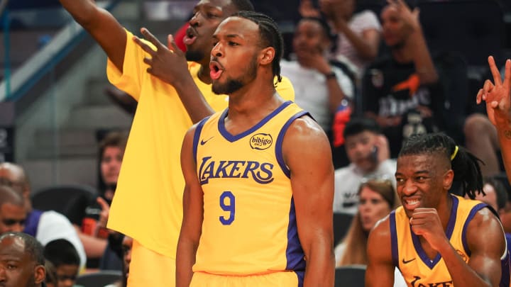 Jul 6, 2024; San Francisco, CA, USA; Los Angeles Lakers guard Bronny James Jr. (9) celebrates from the bench during the third quarter against the Sacramento Kings at Chase Center. Mandatory Credit: Kelley L Cox-USA TODAY Sports