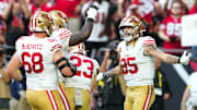 Nov 16, 2025; Glendale, Arizona, USA; San Francisco 49ers tight end George Kittle (85) reacts after a touchdown in the third quarter against the Arizona Cardinals at State Farm Stadium. Mandatory Credit: Joe Camporeale-Imagn Images