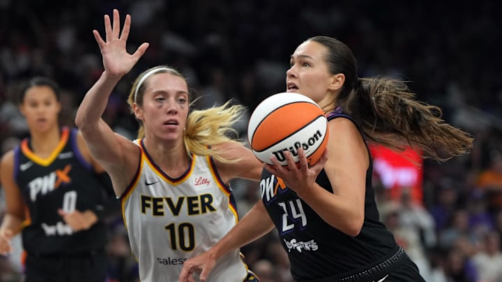 Sep 2, 2025; Phoenix, Arizona, USA; Phoenix Mercury forward Kathryn Westbeld (24) drives past Indiana Fever guard Lexie Hull (10) in the first half at PHX Arena. Mandatory Credit: Rick Scuteri-Imagn Images Sep 2, 2025; Phoenix, Arizona, USA; Phoenix Mercury forward Kathryn Westbeld (24) drives past Indiana Fever guard Lexie Hull (10) in the first half at PHX Arena. Mandatory Credit: Rick Scuteri-Imagn Images