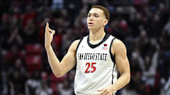 Elijah Saunders reacts after hitting a three during the San Diego State men's basketball game against UNLV at Viejas Arena.