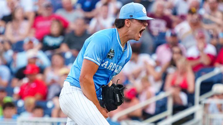 Jun 12, 2026; Omaha, NE, USA; North Carolina Tar Heels starting pitcher Jason DeCaro (29) celebrates after a strikeout against the Mississippi Rebels during the sixth inning at Charles Schwab Field. Mandatory Credit: Dylan Widger-Imagn Images