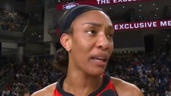 Las Vegas Aces center A'ja Wilson speaks in an in-game interview during the club's 77-75 win over the Chicago Sky at Wintrust Arena on Sunday, August 25, 2024. 