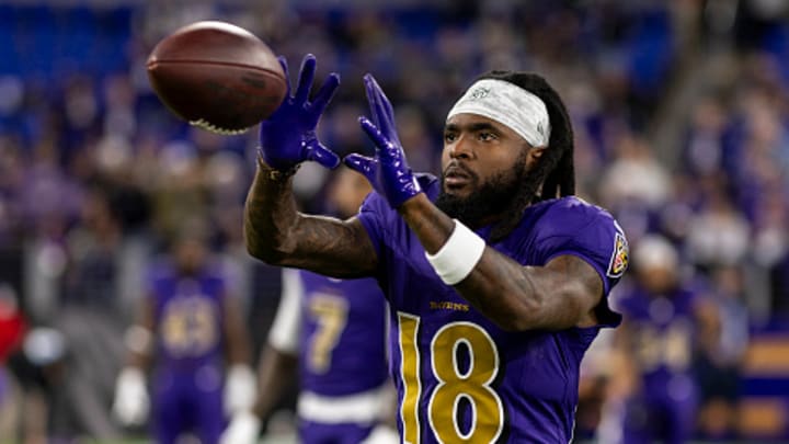 Baltimore Ravens receiver Diontae Johnson warms up for a game. Baltimore Ravens receiver Diontae Johnson warms up for a game.
