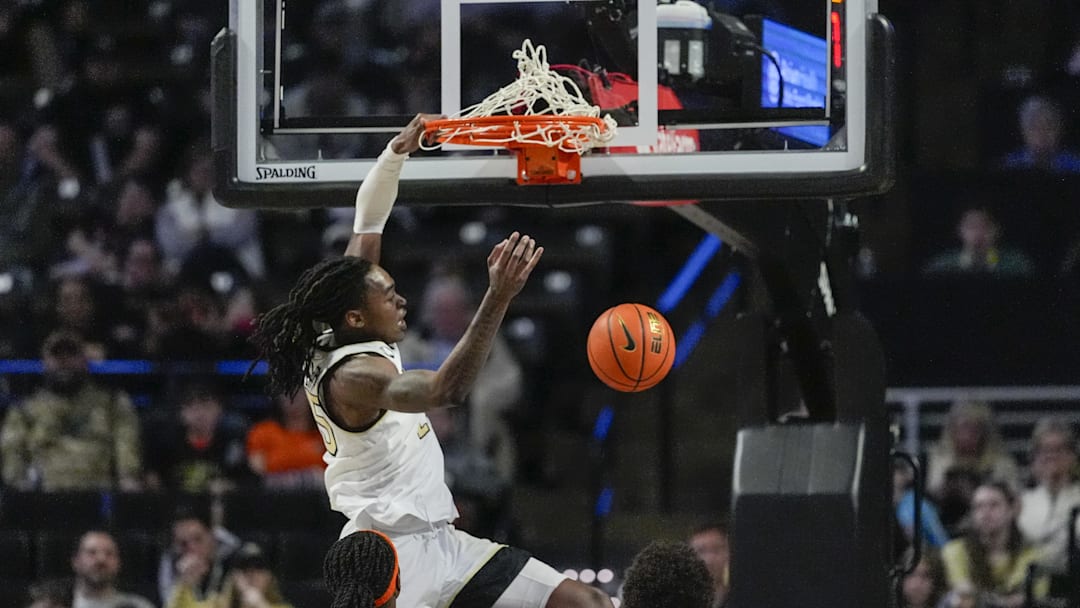 Feb 28, 2026; Winston-Salem, North Carolina, USA; Wake Forest Demon Deacons forward Tre'von Spillers (25) makes a slam dunk against the Syracuse Orange during the secondt half at Lawrence Joel Veterans Memorial Coliseum. Mandatory Credit: Jim Dedmon-Imagn Images