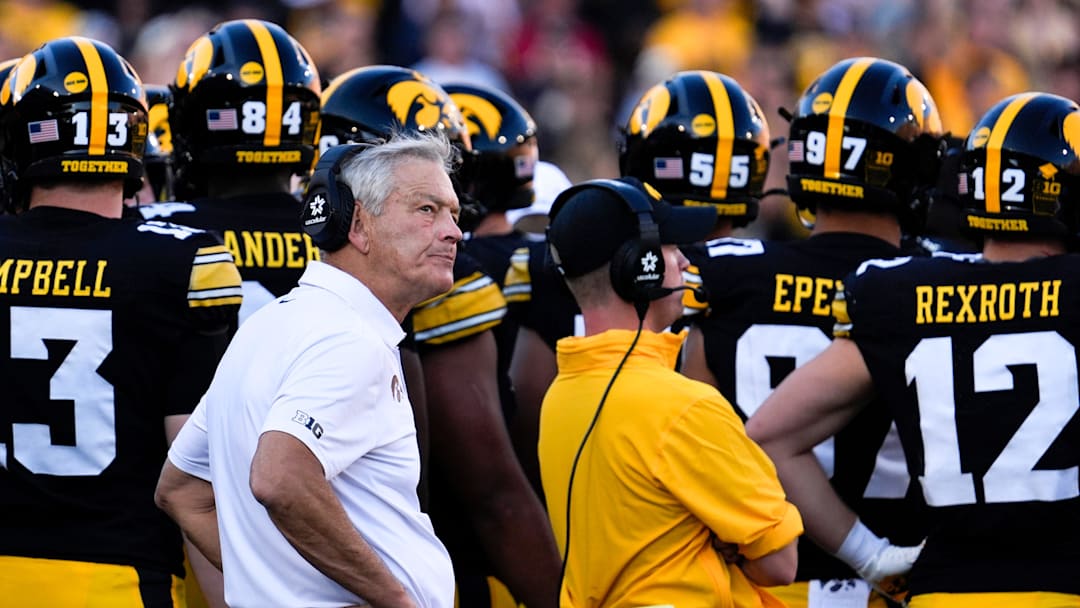 Iowa Hawkeyes head coach Kirk Ferentz huddles with his team during a football game against the Indiana Hoosiers Sept. 27, 2025 at Kinnick Stadium in Iowa City, Iowa.