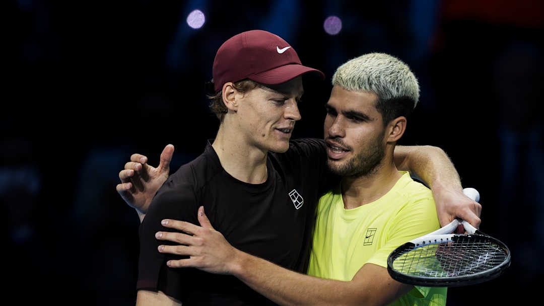 Jannik Sinner (L) of Italy hugs Carlos Alcaraz of Spain at... Jannik Sinner (L) of Italy hugs Carlos Alcaraz of Spain at...