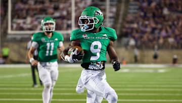 Aug 30, 2025; Manhattan, Kansas, USA; North Dakota Fighting Hawks running back Sawyer Seidl (9) scores a touchdown in the fourth quarter against the Kansas State Wildcats at Bill Snyder Family Football Stadium. Mandatory Credit: Scott Sewell-Imagn Images