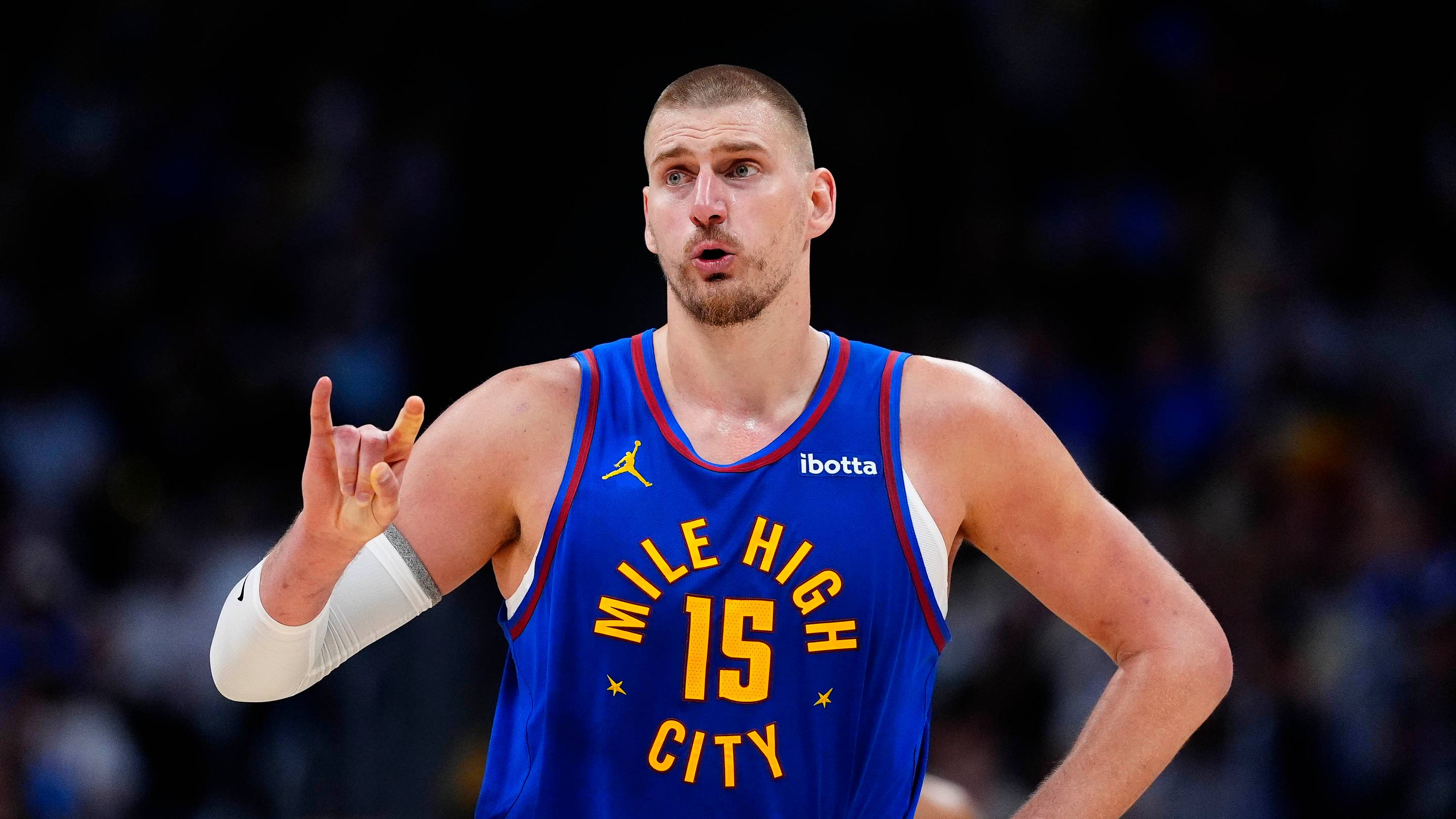 Apr 20, 2026; Denver, Colorado, USA; Denver Nuggets center Nikola Jokic (15) reacts towards the bench in the second half against the Minnesota Timberwolves during game two of the first round of the 2026 NBA Playoffs at Ball Arena.