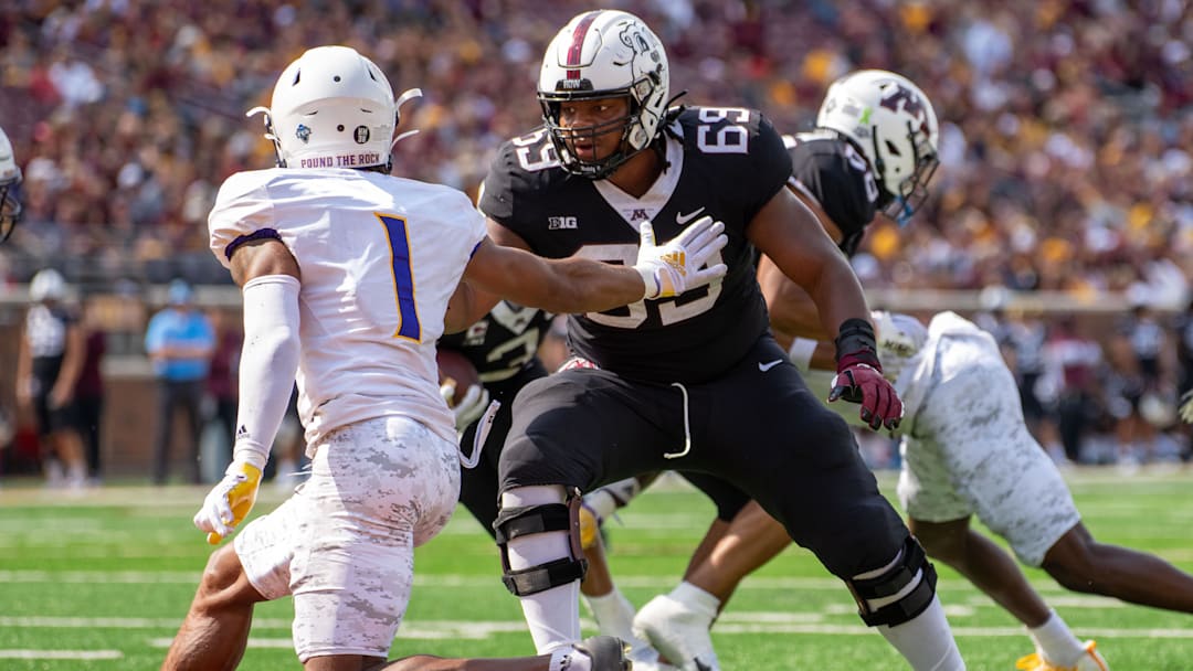 Sep 10, 2022; Minneapolis, Minnesota, USA; Minnesota Golden Gophers offensive lineman Aireontae Ersery (69) blocks Western Illinois Leathernecks defensive back JJ Ross (1) in the second quarter at Huntington Bank Stadium. Mandatory Credit: Matt Blewett-Imagn Images
