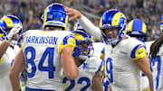 Nov 23, 2025; Inglewood, California, USA; Los Angeles Rams tight end Colby Parkinson (84) is congratulated by quarterback Matthew Stafford (9) after catching a touchdown pass against the Tampa Bay Buccaneers at SoFi Stadium. Mandatory Credit: Jayne Kamin-Oncea-Imagn Images