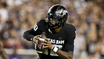 Oct 26, 2024; College Station, Texas, USA; Texas A&M Aggies quarterback Marcel Reed (10) runs the ball in the fourth quarter against the LSU Tigers at Kyle Field. Mandatory Credit: Maria Lysaker-Imagn Images. 