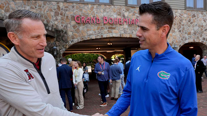 Alabama head coach Nate Oats and Florida head coach Todd Golden